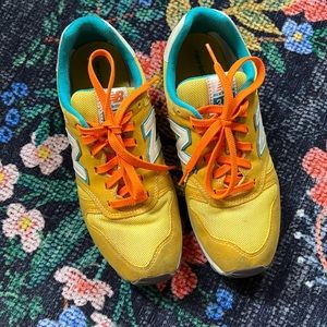 Yellow New Balance 373 retro sneakers